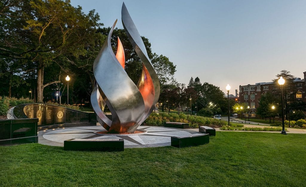 The Providence College Flame sculpture installation on campsus